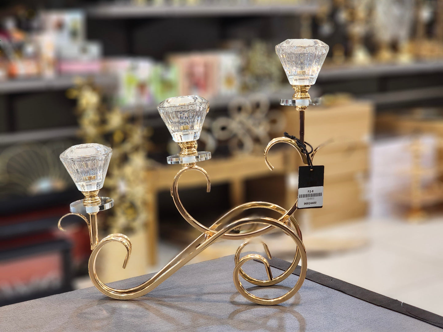 Elegant Golden Candelabra with Crystal Votive Holders