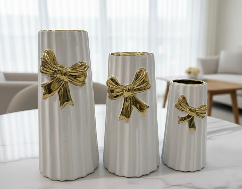 Elegant White and Black Ceramic Fluted Vases with Gold Bow Accent (Only In Karachi)