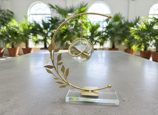 Elegant Golden Balance Sphere Ornament with Crystal Globe