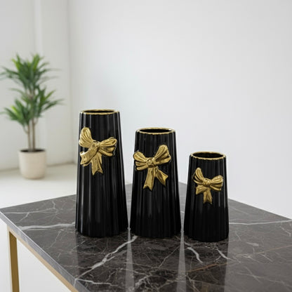Elegant White and Black Ceramic Fluted Vases with Gold Bow Accent (Only In Karachi)