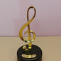 Musical Notes Wind-Up Music Box – Golden Rotating Melody Showpiece for Music Lovers