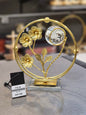 Elegant Golden Floral Circular Metal Sculpture with Crystal Accent