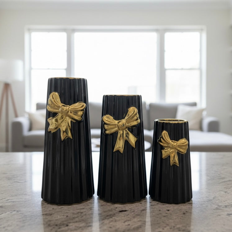 Elegant White and Black Ceramic Fluted Vases with Gold Bow Accent (Only In Karachi)