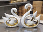 Elegant Ceramic Swan Pair with Gold Accents