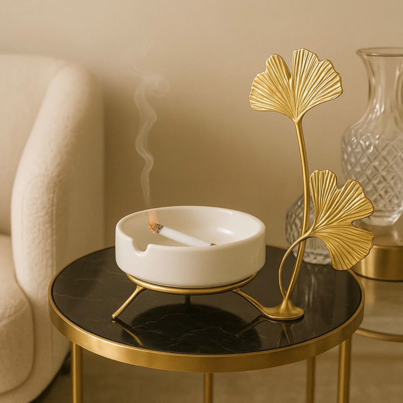 LUXURY VILLA SIDE TABLE DECOR - CERAMIC ASHTRAY WITH LIT CIGARETTE & GOLD GINKGO LEAF ORNAMENT