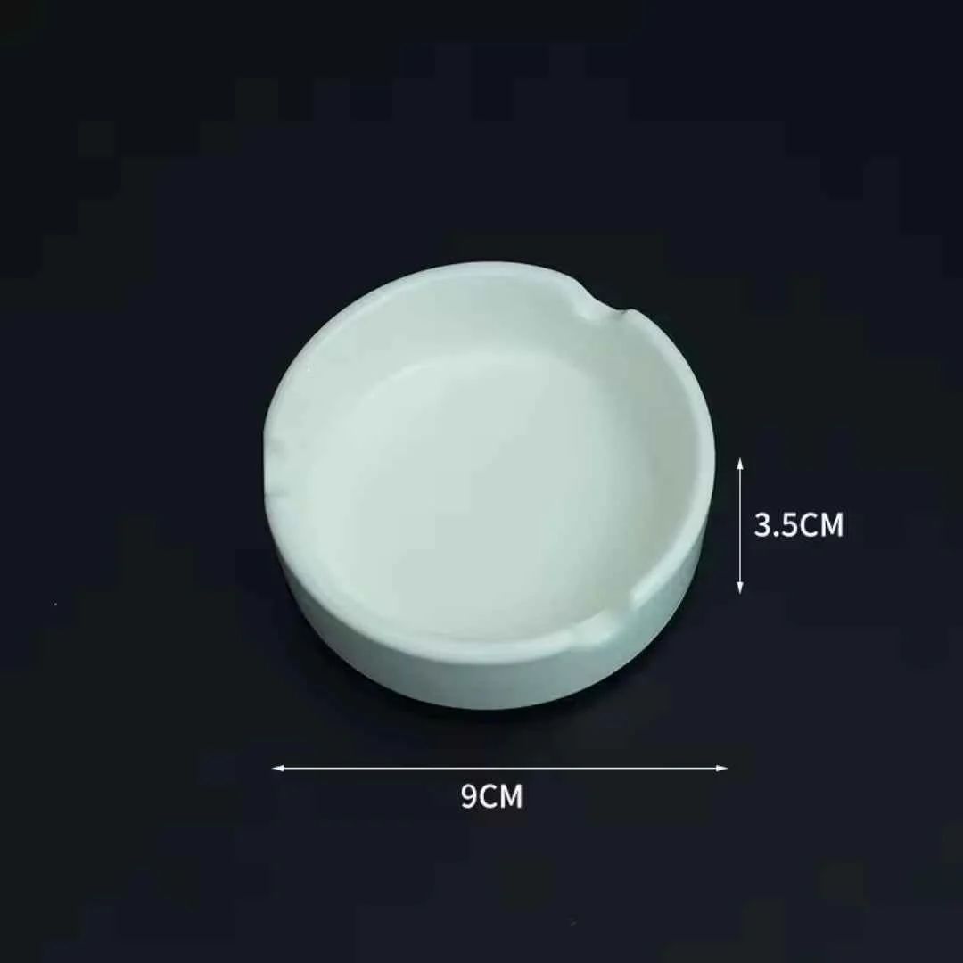 LUXURY VILLA SIDE TABLE DECOR - CERAMIC ASHTRAY WITH LIT CIGARETTE & GOLD GINKGO LEAF ORNAMENT